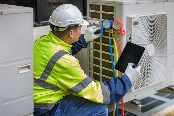 Professional Heat Pump Repair technician working in Nokomis, FL